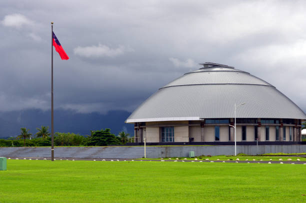 Parliament of Samoa building (Maota Fono), Apia, Samoa Apia, Samoa: Parliament of Samoa Legislative Assembly (Maota Fono) and Samoan flag - iconic building inspired in domed Fono houses of village councils - Guida Moseley Brown Architects (Australia) - Mulinu’u Peninsula. apia samoa stock pictures, royalty-free photos & images