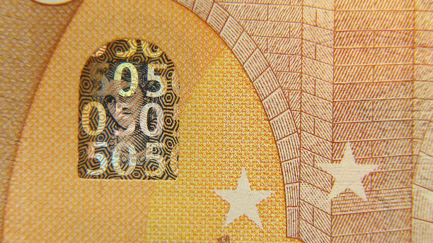 Part of a 50 euro paper bill. Macro photo. Cash. Without lighting. stock photo