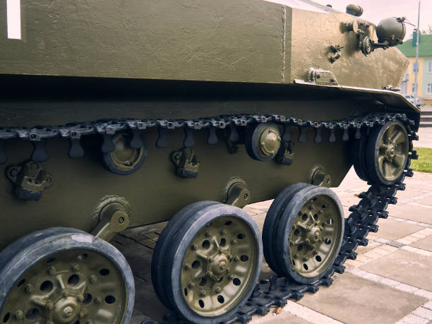 part of the airborne combat vehicle, front part of the chassis, tracked drive - front view old jeep stockfoto's en -beelden