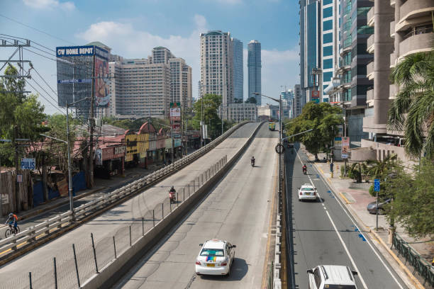 Pasig, Metro Manila, Philippines - A less than busy day along an overpass in Meralco Avenue, Ortigas Center. stock photo