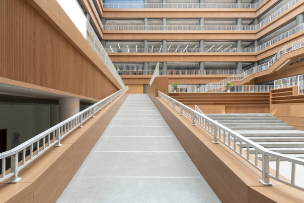 A passage to the upper floor of a library A passage to the upper floor of a library expensive universities stock pictures, royalty-free photos & images