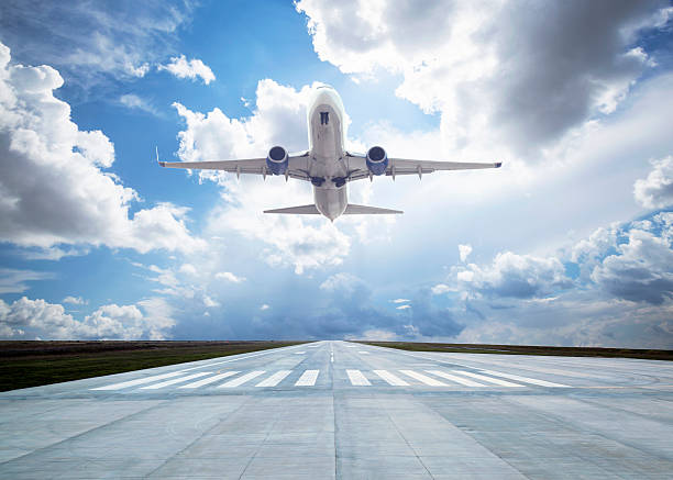 Passenger airplane taking off Passenger airplane taking off airport runway stock pictures, royalty-free photos & images