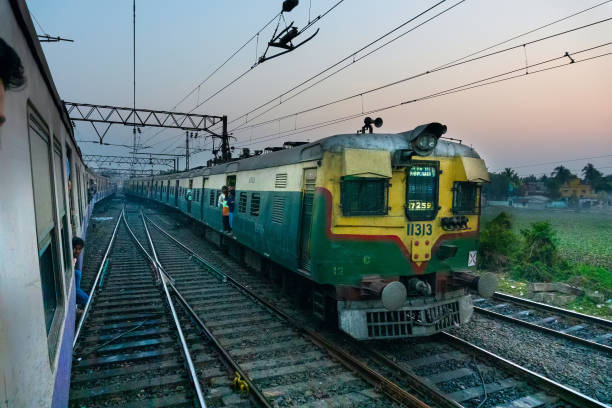 Passenger train over railway track - India stock photo