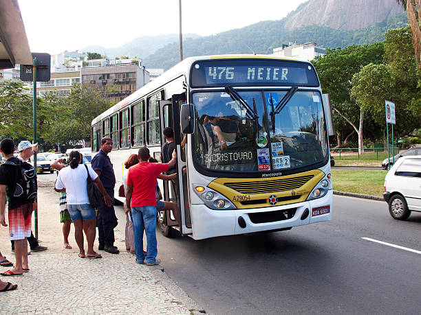 Passengers boarding a bus in Rio De Janeiro stock photo