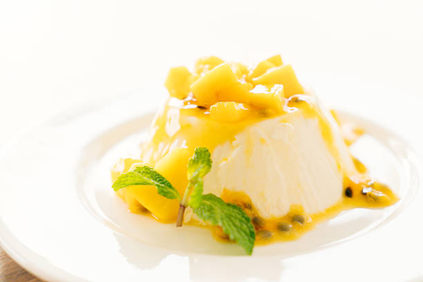 Passion fruit panna cotta stock photo
