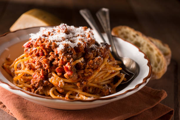 Pasta Bolognese Bucatini Bolognese (Pasta with Meat Sauce) bolognese sauce stock pictures, royalty-free photos & images
