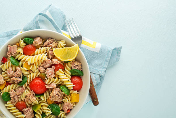 Pasta salad with tuna fish and vegetables stock photo