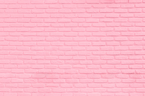 Pastel pink brick wall texture background
