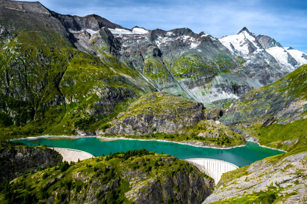 Pasterze Glacier Lake With Hydropower Dam In National Park Hohe Tauern With Großglockner High Alpine Road In Austria stock photo