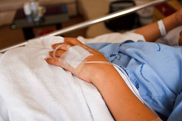 Patient at the hospital. Treating people with the brine. infusion therapy stock pictures, royalty-free photos & images