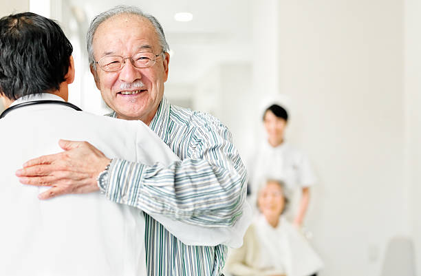 Patient who thanks his doctor stock photo