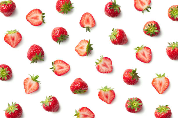 Pattern of fresh strawberries Pattern of strawberries isolated on white background. Top view strawberries stock pictures, royalty-free photos & images