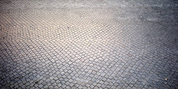 Paving stones background Top view on texture background of straight flat stony brick grey paving stone street road outdoor copyspace, horizontal picture cobblestone stock pictures, royalty-free photos & images