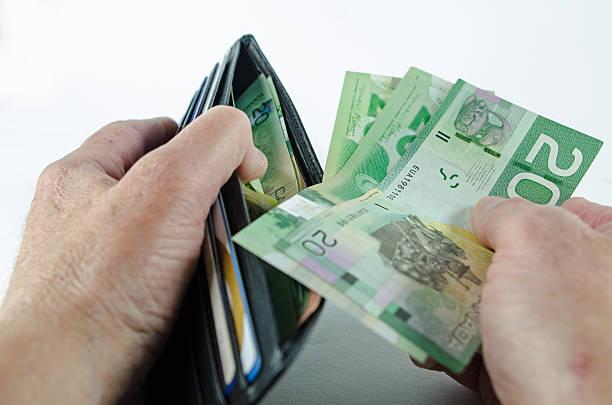 Paying in Canadian Dollars stock photo