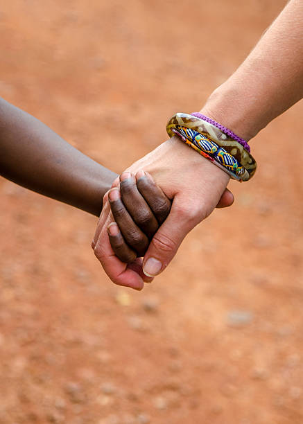 Peace on Earth Symbol - Holding Africa in the Hands stock photo