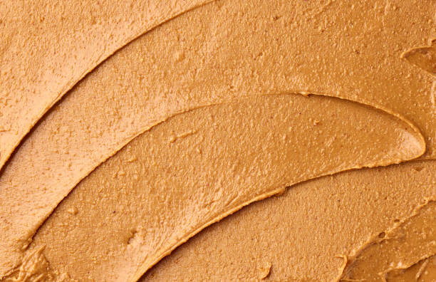 peanut butter texture stock photo