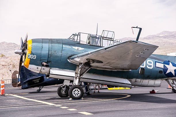 Pearl Harbor Avenger Bullhead City, Arizona, USA - April 6, 2013: Classic World War II era American and Japanese aircraft on display at an air show. ww2 american fighter planes pictures stock pictures, royalty-free photos & images