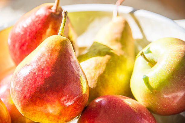 Pears and apples stock photo