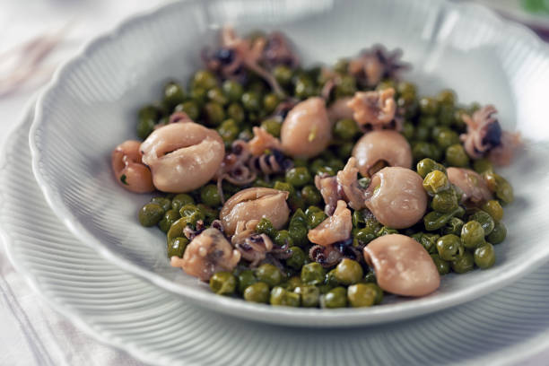 Peas with cuttlefish stock photo