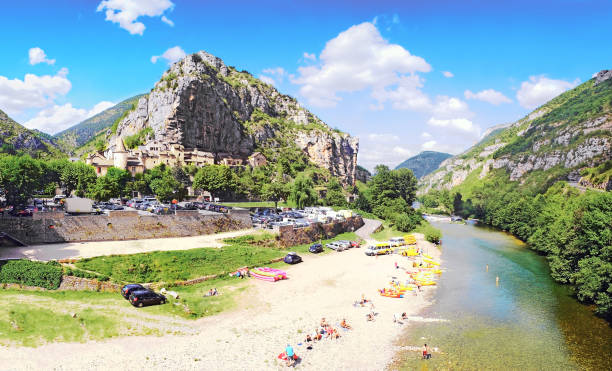 Pebble Beach in the Gorges du Tarn. The Malene. 31 July 2014. Tourism is very important in summer in the small village of La Malène. Holidaymakers enjoy the activities related to the presence of the river. gorges du tarn stock pictures, royalty-free photos & images