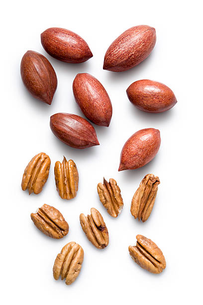 Pecan nuts isolated on white background stock photo
