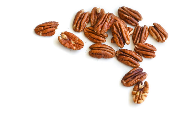 Pecan on white background - isolated Pecan on white background - isolated pecan stock pictures, royalty-free photos & images