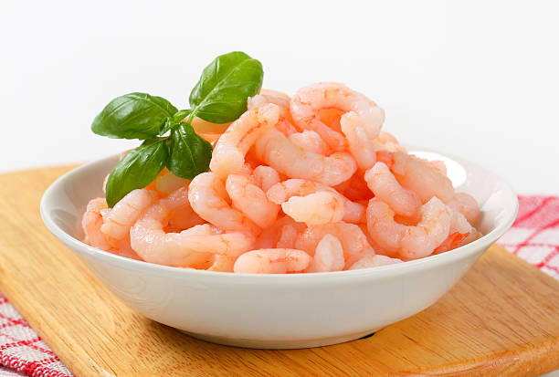 Peeled shrimps Bowl of plain peeled shrimps peeled stock pictures, royalty-free photos & images