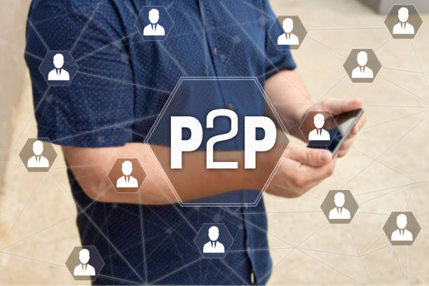 Peer to peer. P2P on the touch screen with a blur background of the businessman with the phone.The concept of Peer to peer, P2P stock photo