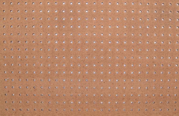 Peg Board Close up of Peg Board pegboard stock pictures, royalty-free photos & images