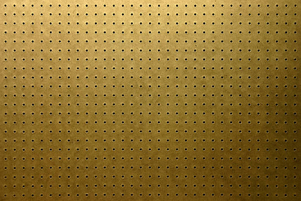 Pegboard texture An empty "canvas" waiting for tools, lit from above. pegboard stock pictures, royalty-free photos & images