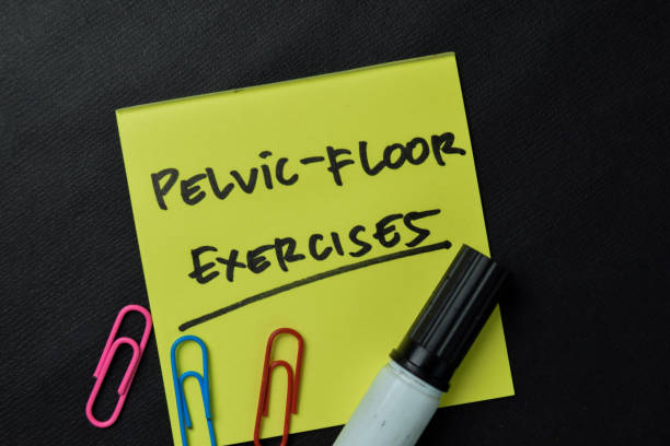 Pelvic-Floor Exercises write on sticky notes isolated on office desk. stock photo