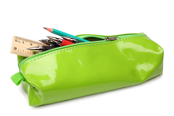 Pencil case with school supplies stock photo