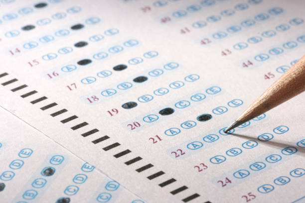 Pencil filling in an answer sheet stock photo