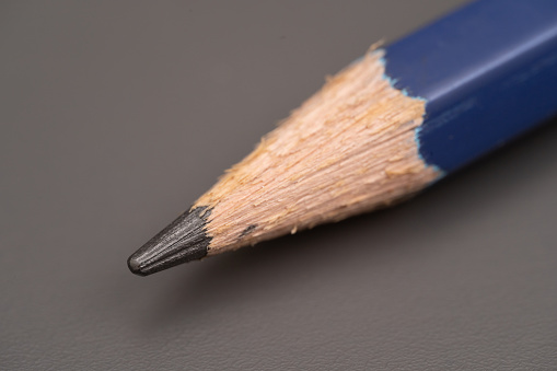 Pencil point close up. Detail view of a blue pencil