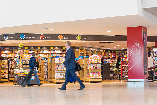 People and duty free bookshop in Melbourne Airport stock photo