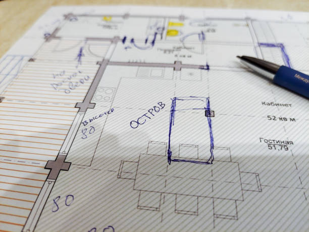 people draw a plan of an apartment or house on a piece of paper. - aanwijzen plattegrond stockfoto's en -beelden