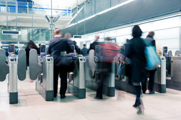 People Entering Modern Subway Station in Canary Wharf, London, Blurred Motion stock photo