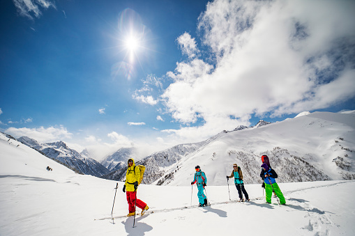 People going back country skiing