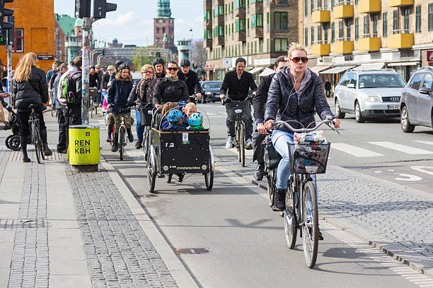 People going by bike in Copenhagen stock photo