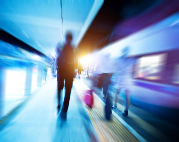 People hurrying to catch a train. blurred motion stock photo