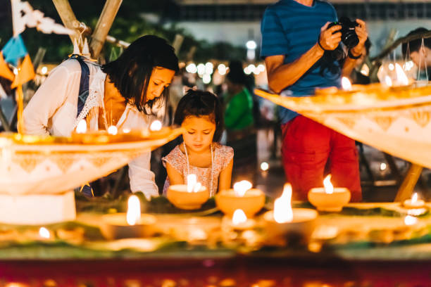 People in Loy Krathong festival of Thailand stock photo