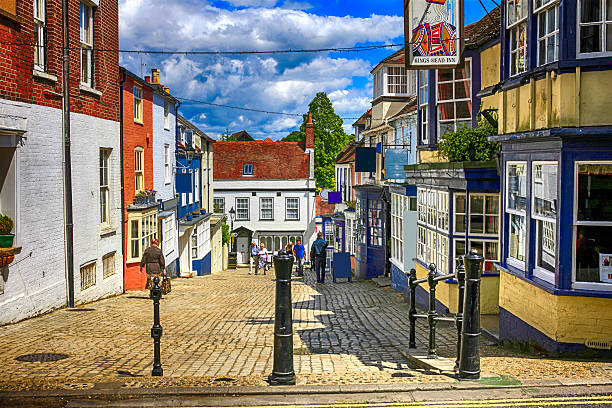 People in the old historic district of Lymington, UK stock photo