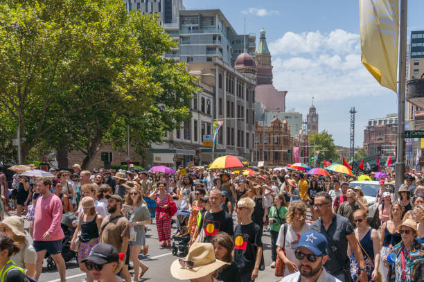 People on protest march on Australia Day in Sydney, Australia stock photo