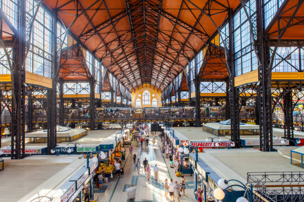 People shopping in central market hall in Budapest, Hungary. stock photo