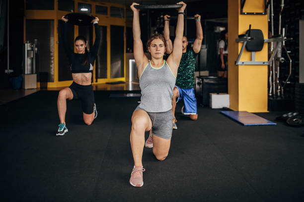 People training together in gym stock photo