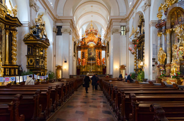 People visit Church of Our Lady of Triumphant (Church of Our Lady Victorious and St. Anthony of Padua), Prague, Czech Republic stock photo