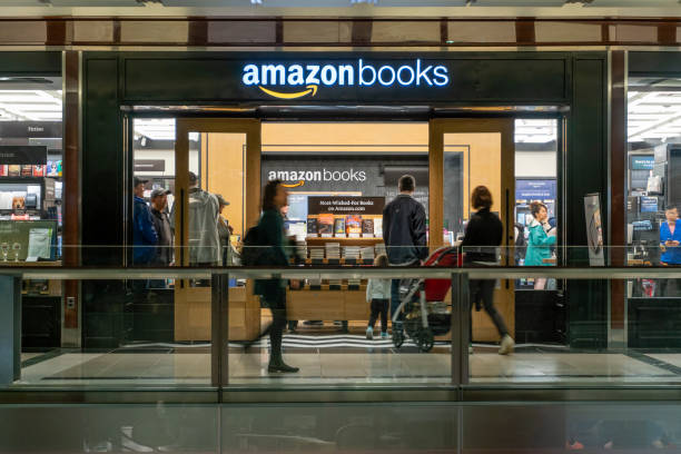 People visiting the Amazon Books store stock photo