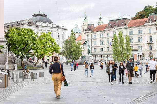 People walking in the city center in Ljubljana stock photo