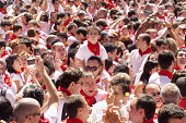 "Pamplona, Spain - July 6, 2011:  People in the square in front of the municipality at the opening of the San Fermin festival.  Noon"