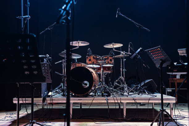Percussions on stage. Musical instrument. Playing drums. Drum sticks. Event performance. Live concert. stock photo